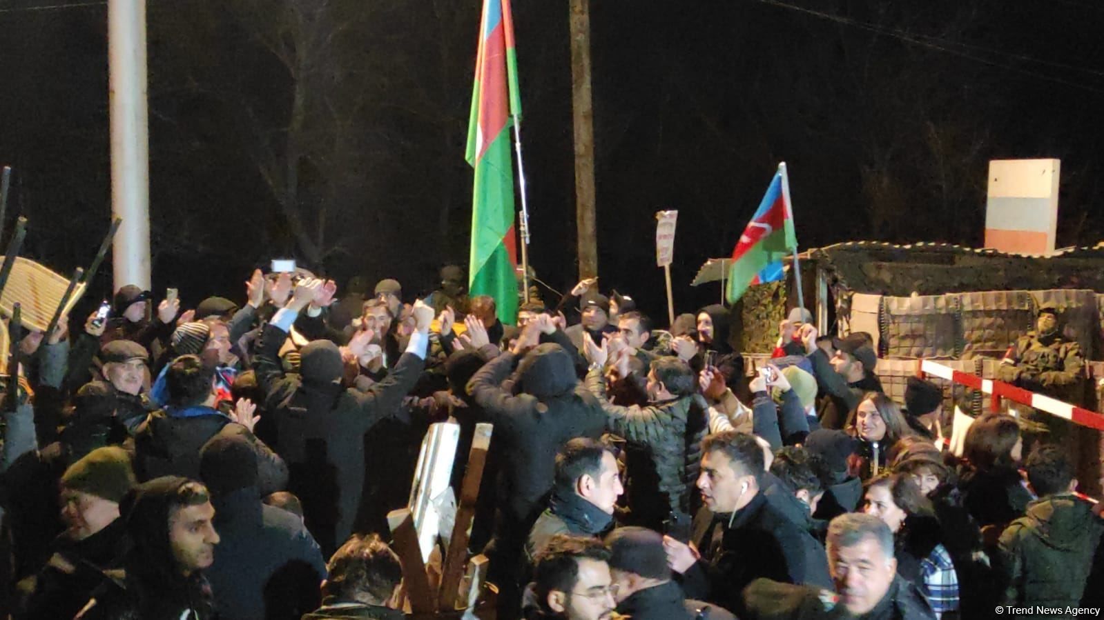 Peaceful protesters once again sing national anthem of Azerbaijan near ...