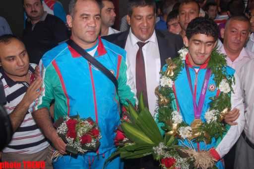 Azeri athletes back after successful performance at Olympics