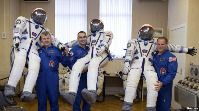 Space station crew lands in Kazakhstan